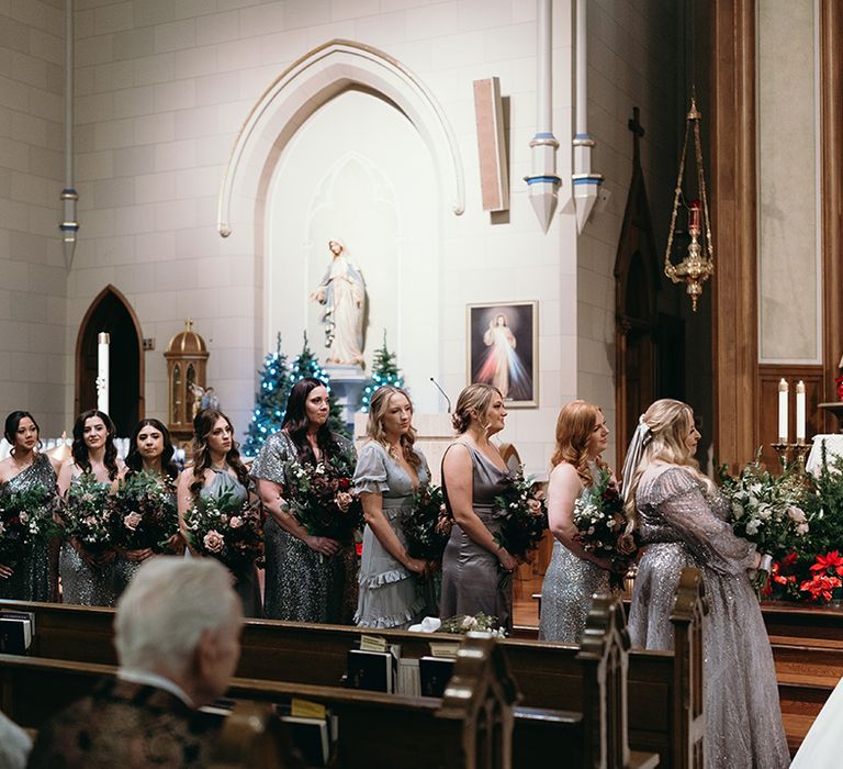 church-wedding-with-large-bridal-party-wearing-silver-bridesmaid-dresses