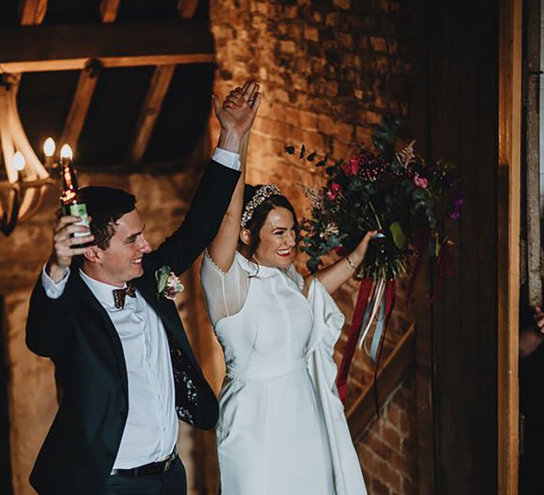 bride wearing a high neck bespoke wedding dress