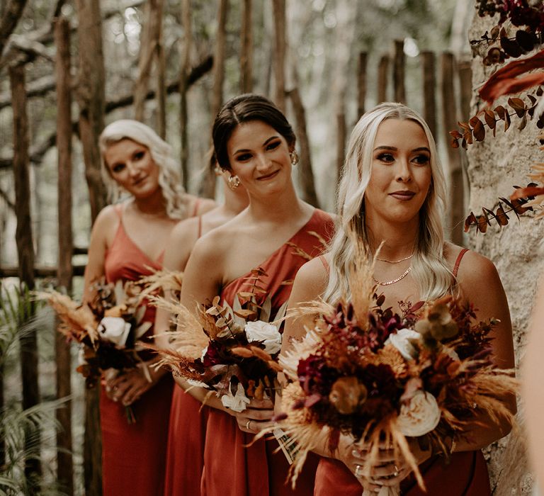 bridesmaid-at-outdoor-wedding-ceremony-tulum-mexico