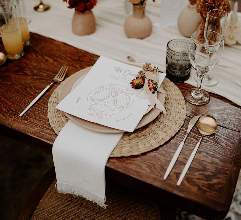 wicker-place-mat-with-boho-decorations-and-colourful-flowers