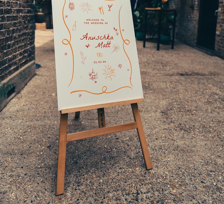 orange-and-white-wedding-welcome-sign