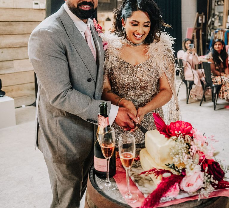 bride-and-groom-cut-their-wedding-cake