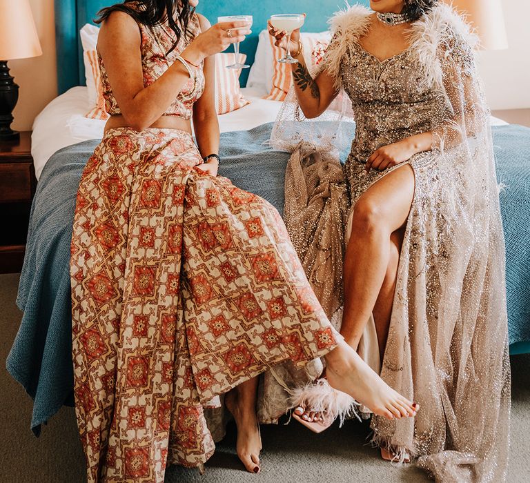 bride-with-bridesmaid-having-wedding-cocktail