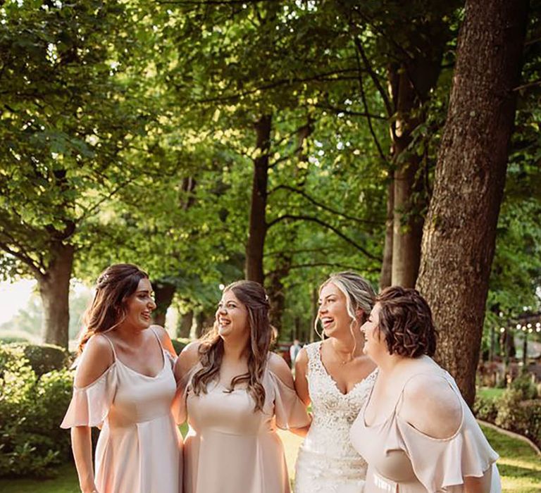 pale pink/ blush coloured boho-style bridesmaid dresses