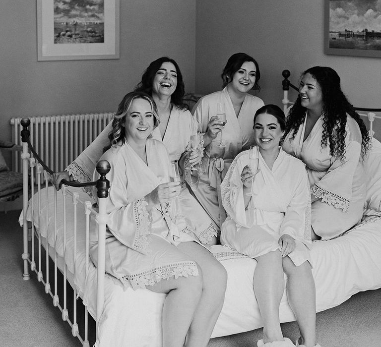 bridal-party-in-robes-getting-ready-for-wedding-day