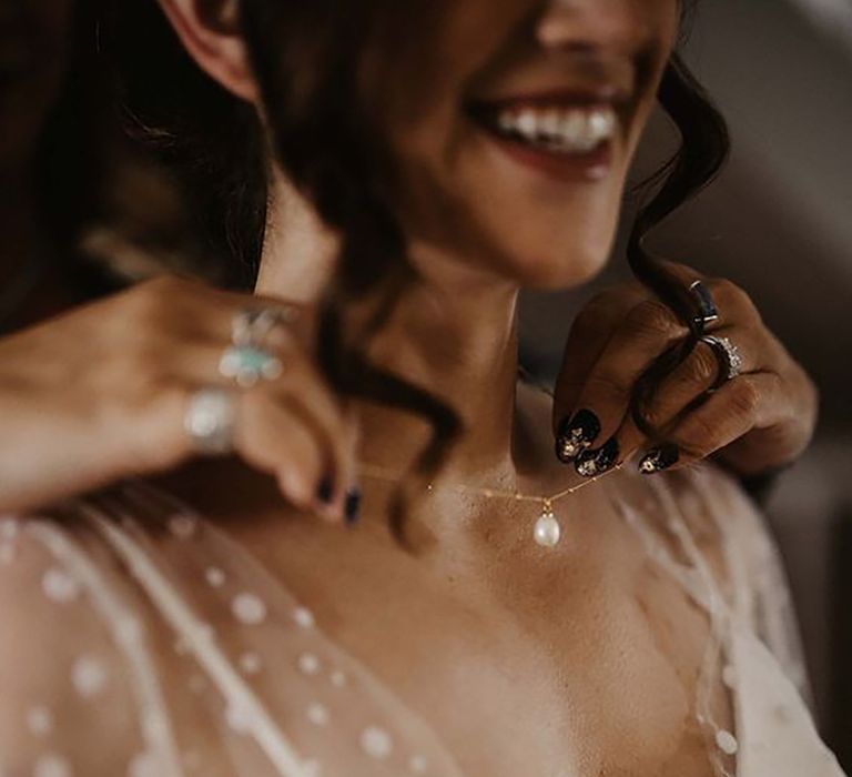 delicate pearl drop wedding necklace with v neckline 