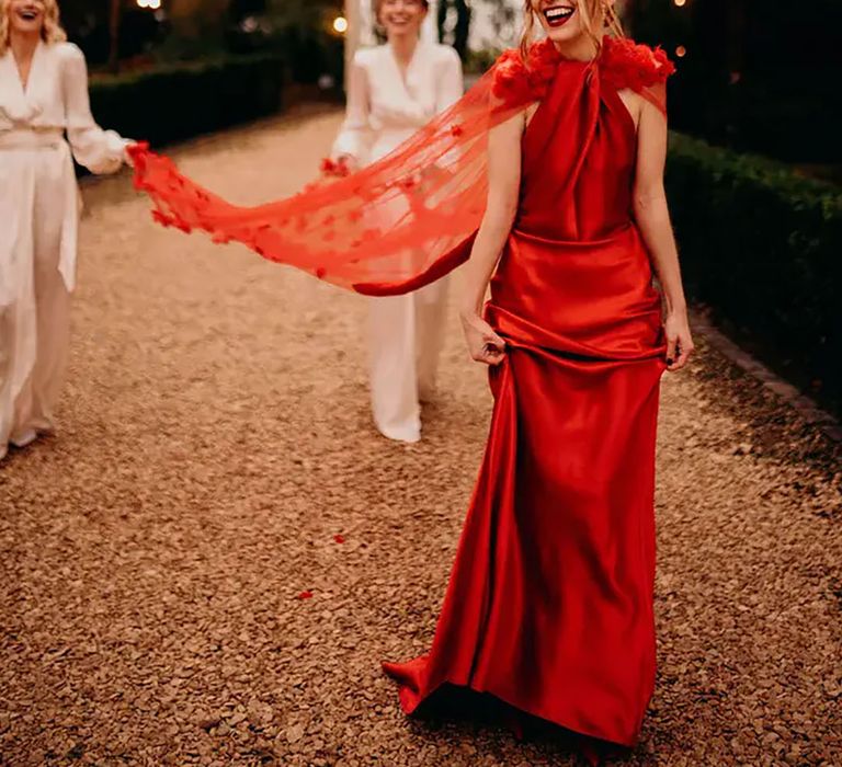 red winter wedding dress with cape for winter wedding