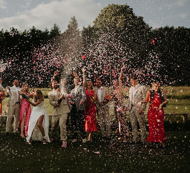 champagne-spray-wedding-photo-with-the-wedding-party