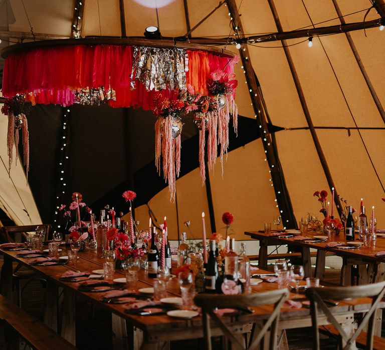 pink-and-silver-streamer-decorations-at-marquee-wedding