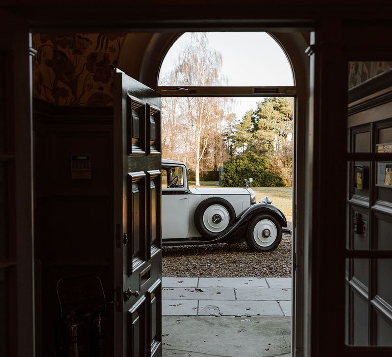 cuckney house nottinghamshire wedding venue with wedding car outside