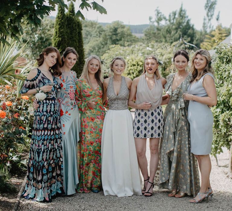 wedding guests wearing summer cocktail style dresses 