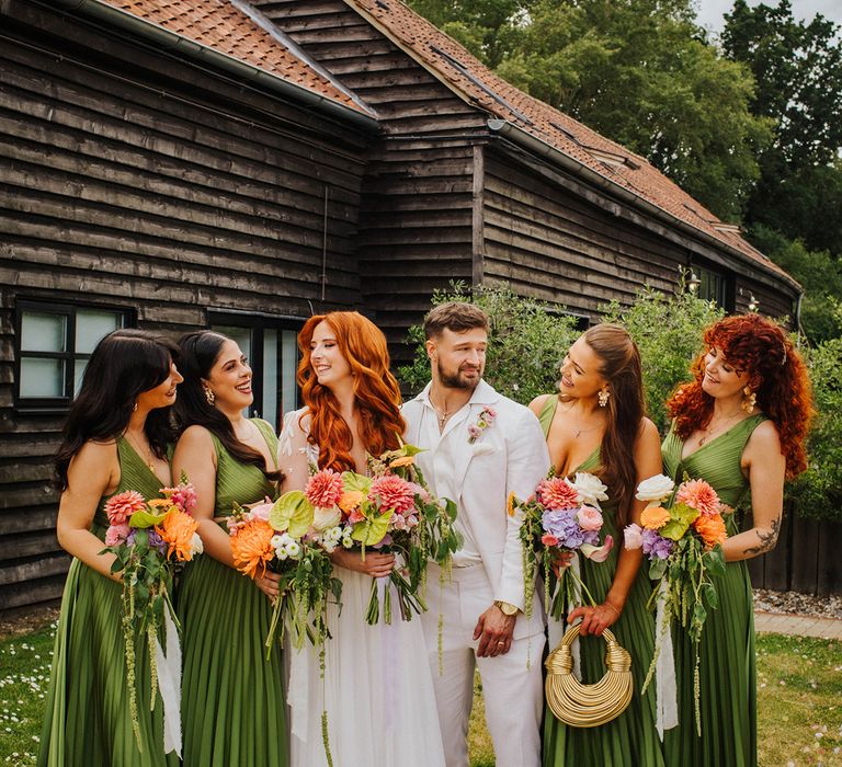 bridal-party-in-dark-green-pleated-bridesmaid-dresses