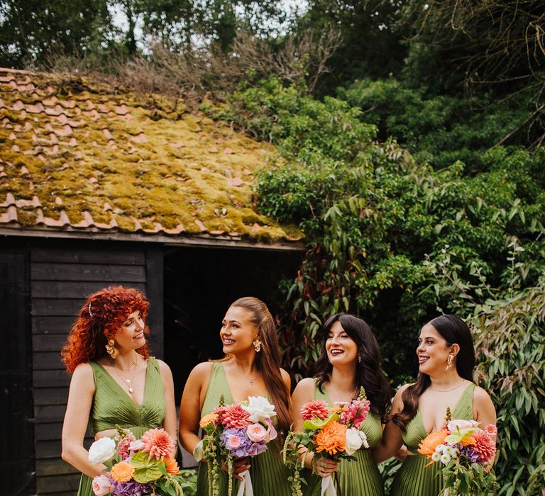 bridal-party-with-pleated-green-bridesmaid-dresses