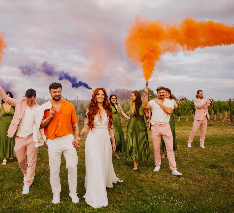 orange-smoke-bomb-wedding-photo-with-groom-in-orange-shirt.