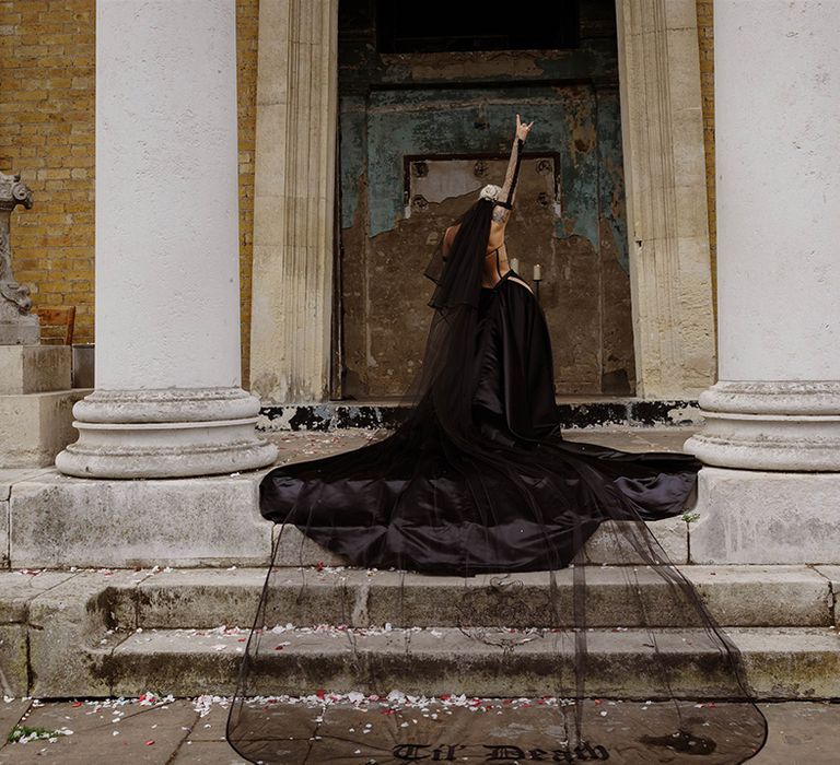 bride-with-black-wedding-dress-and-veil-at-gothic-wedding