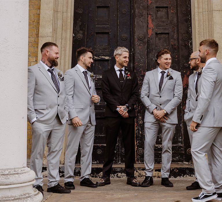 groomsmen-in-light-grey-wedding-suits-with-groom-at-asylum-chapel-wedding