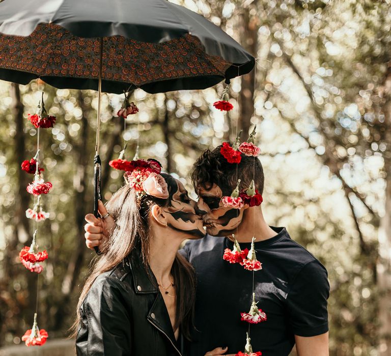 umbrella-with-flowers-for-dia-de-los-muertos-wedding-inspiration-with-facepaint