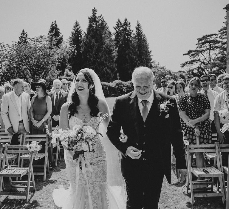 bride-walking-down-the-aisle-with-father-of-the-bride