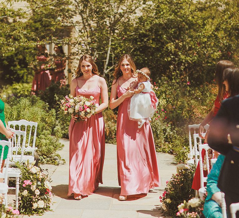 bridesmaids-wearing-pink-satin-bridesmaid-dresses