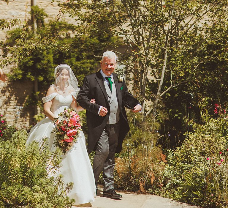 father-of-the-bride-walks-bride-down-the-aisle