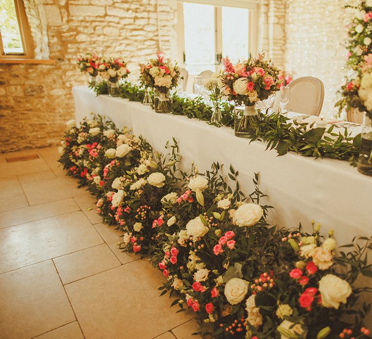 top-table-decorated-with-pink-and-white-wedding-flowers