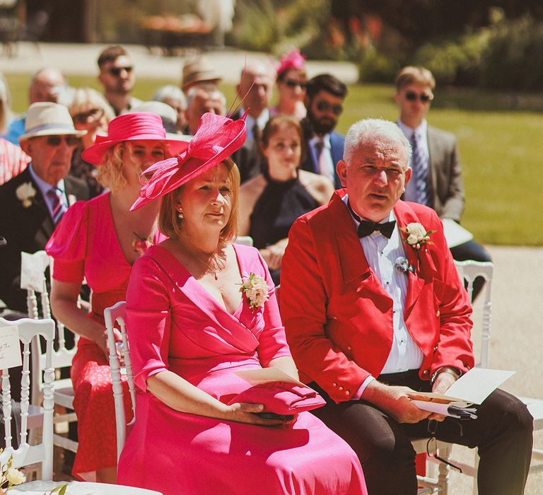 wedding-guests-wearing-pink-wedding-guest-outfits