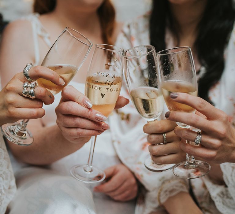 bridal-party-drinking-champagne