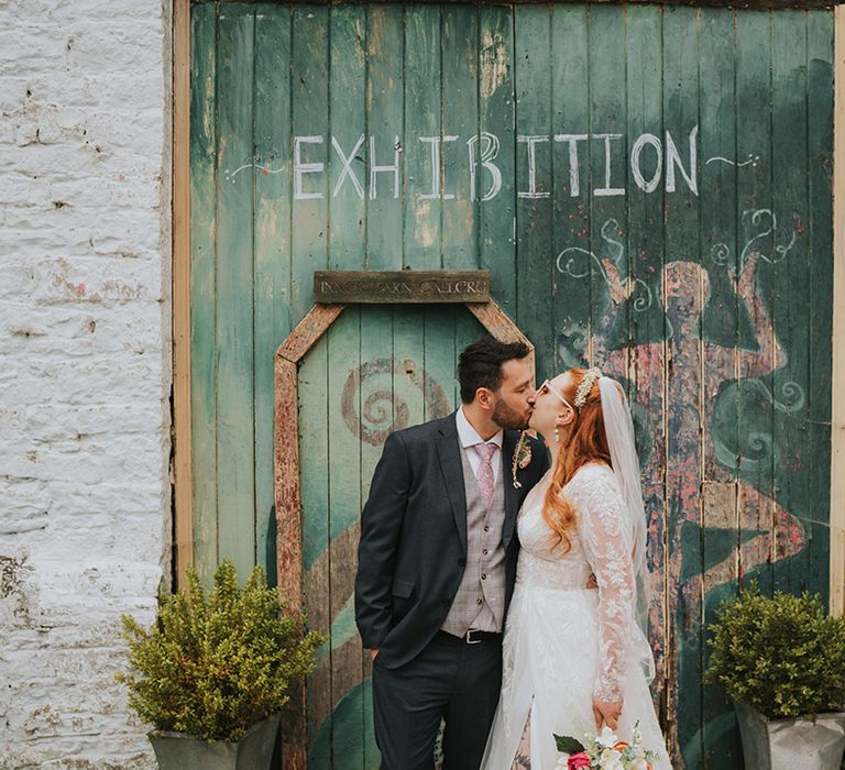 bride-and-groom-kiss-at-wedding