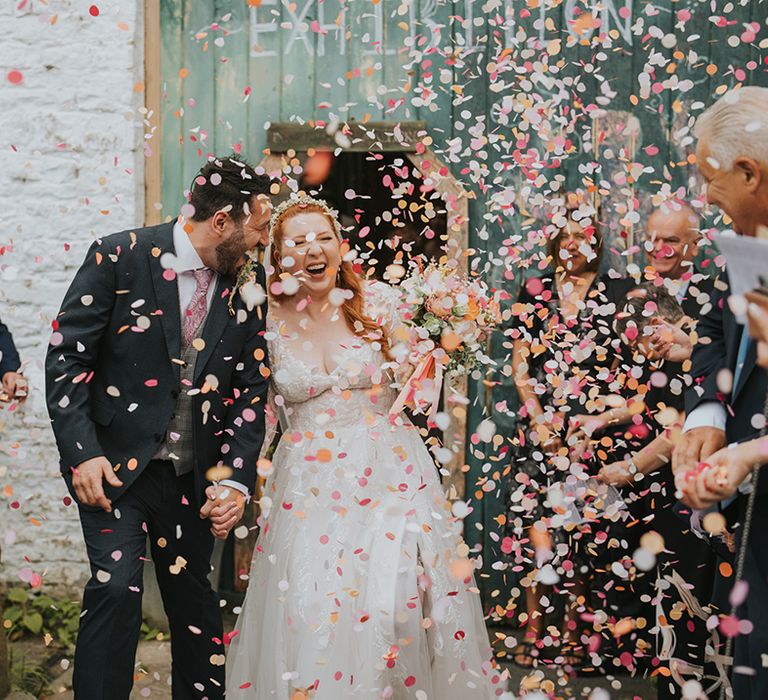 colourful-confetti-moment-at-barn-wedding