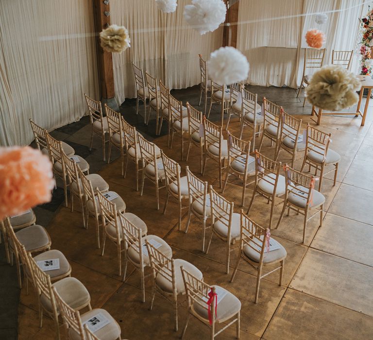 peach-and-white-hanging-decor-at-barn-wedding