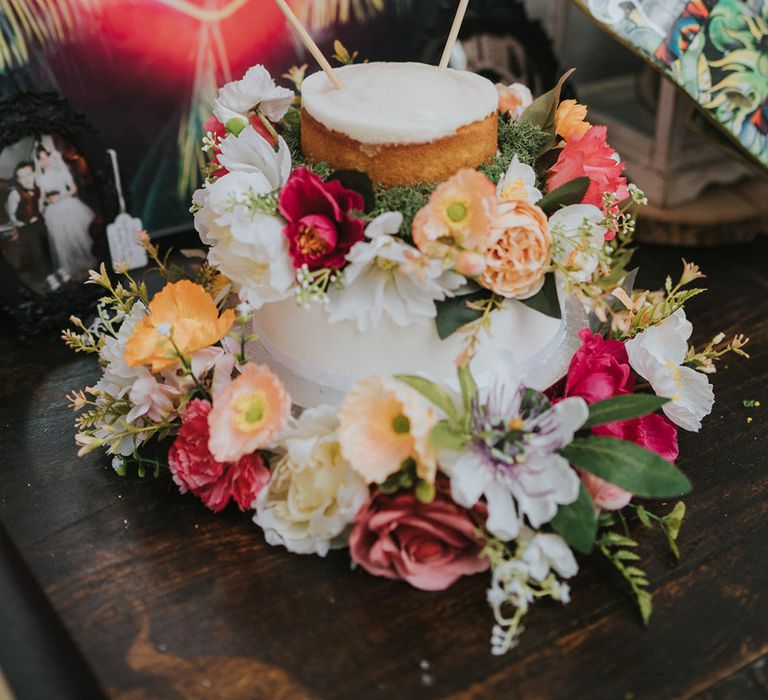 two-tier-wedding-cake-with-colourful-flowers