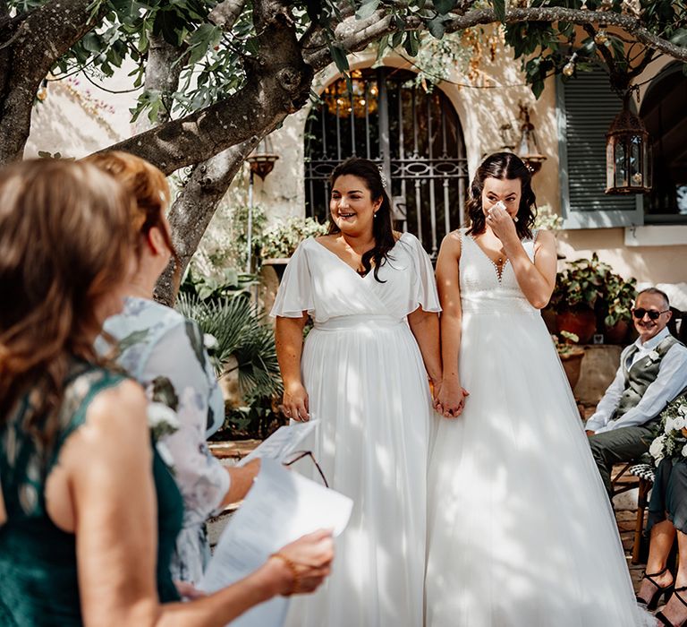 brides-walk-down-the-aisle-together