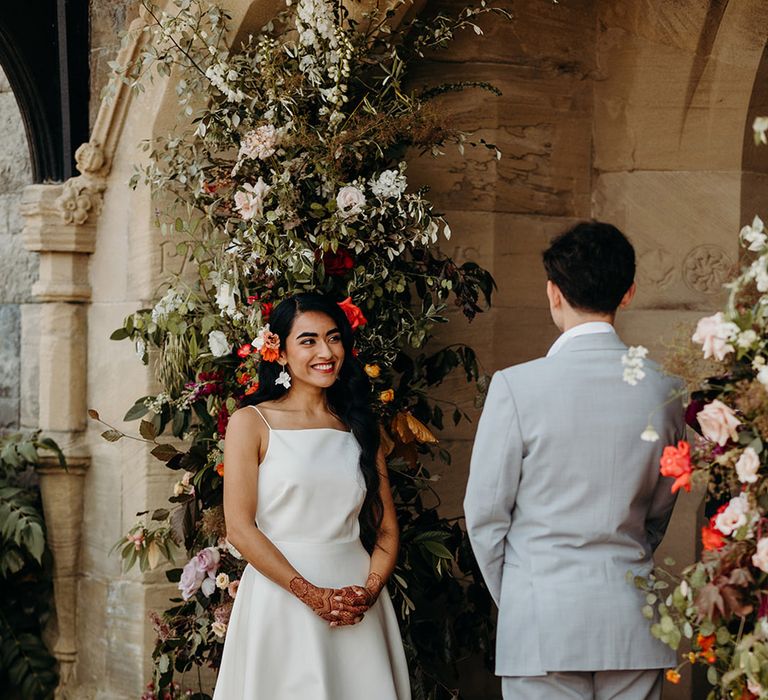 bride-and-groom-exchanging-wedding-vows-at-plas-dinam