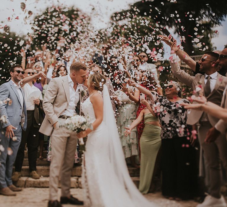 confetti-thrown-over-wedding-guests