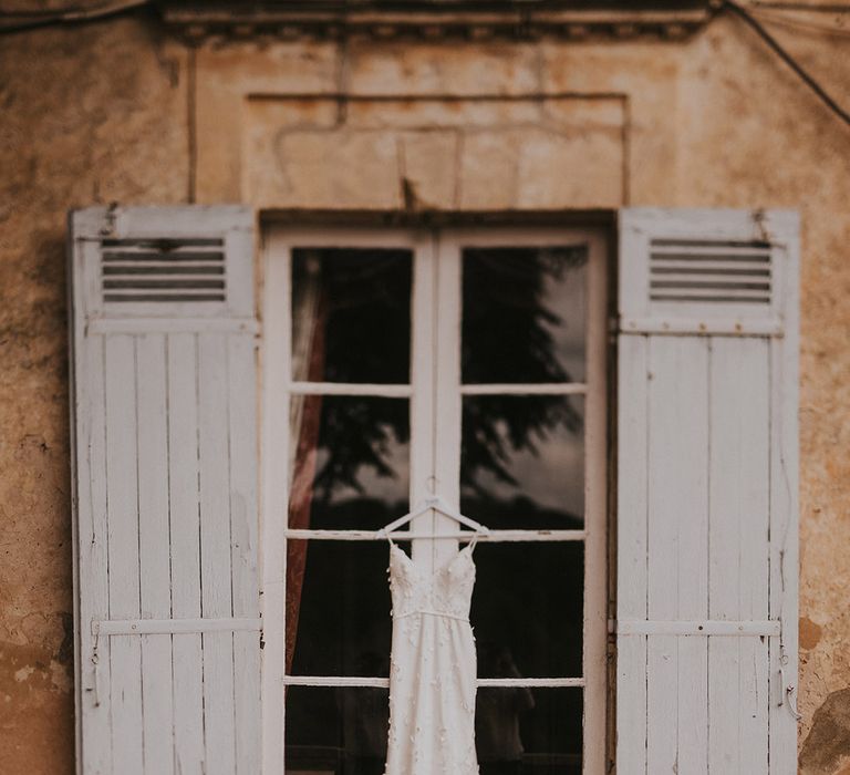 wedding-dress-on-hanger-at-destination-wedding