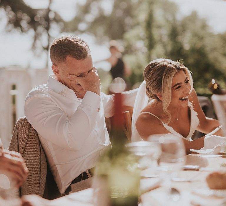 wedding-speeches-making-bride-and-groom-laughing-at-chateau-wedding