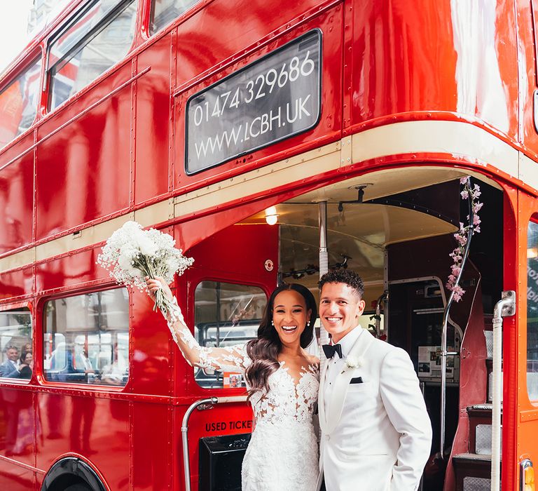 bride-and-groom-on-red-double-decker-bus-wedding-transport