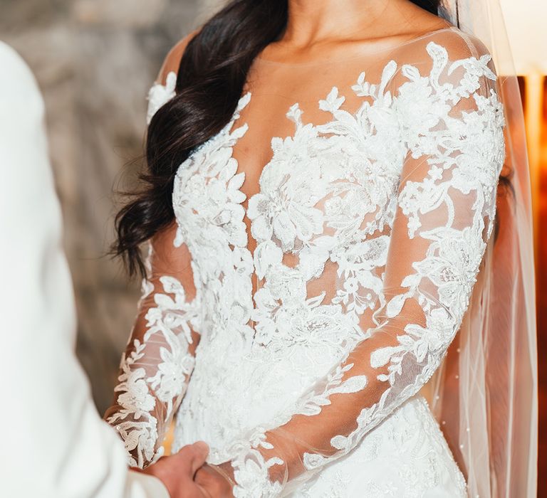 bride-in-illusion-lace-wedding-dress-with-long-sleeves