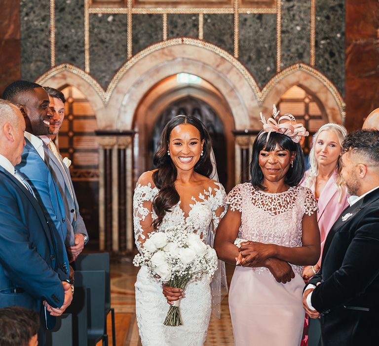 walking-down-the-aisle-with-mother-of-the-bride-in-pink-dress