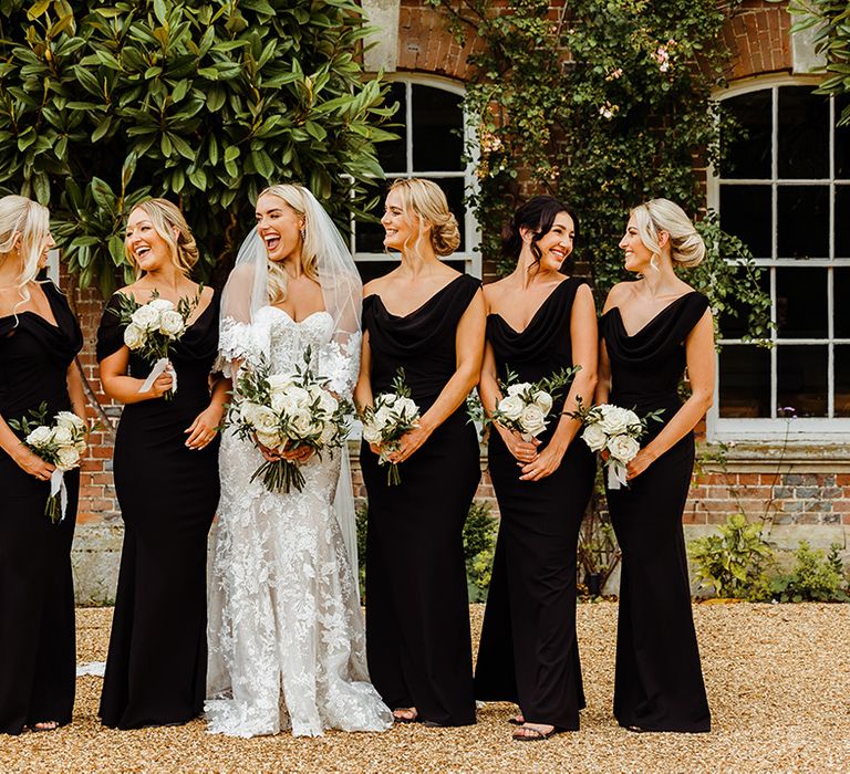 bridal-party-wearing-black-bridesmaid-dresses-at-syrencot-wedding