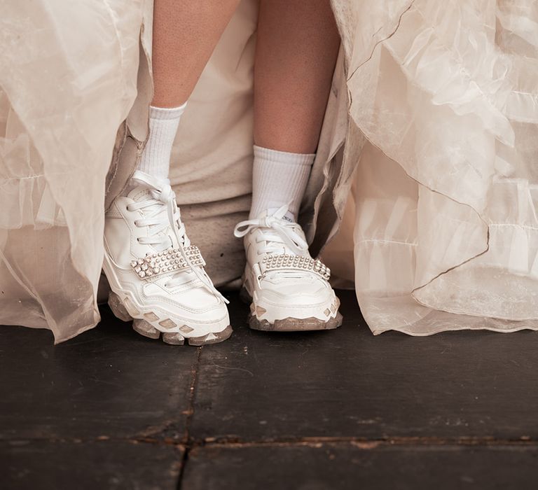 bride-wearing-diamante-wedding-trainers