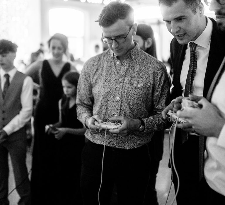 guests-playing-video-games-at-wedding