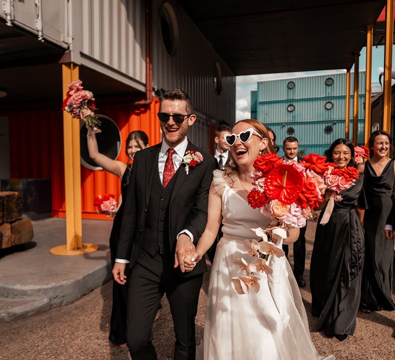 halfpenny-london-wedding-dress-with-groom-in-black-suit-at-industrial-style-city-wedding