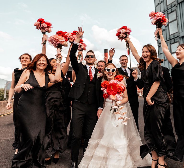 wedding-party-with-black-suits-and-bridesmaid-dresses-for-london-city-wedding