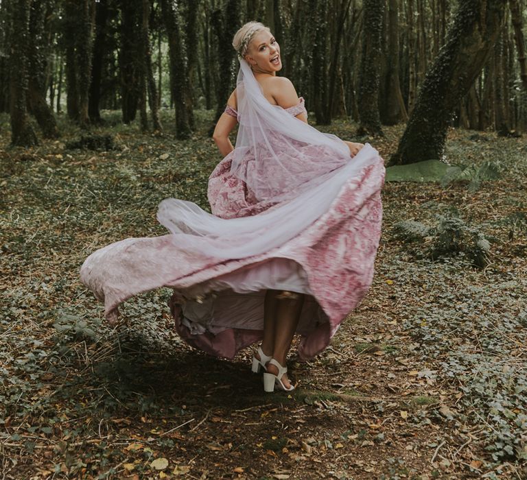 bride-with-close-shaved-short-hair-wearing-veil-and-pink-dress