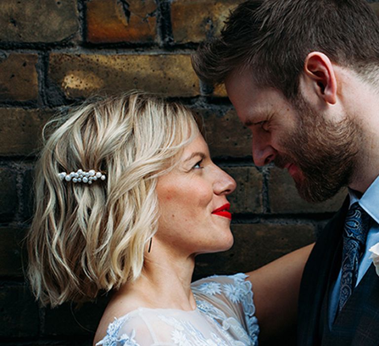 bride-with-blonde-curly-short-hair-with-pearl-hair-pin