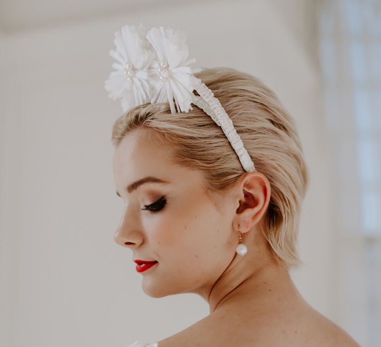 bride-wearing-white-flower-crown-headband-with-short-hair