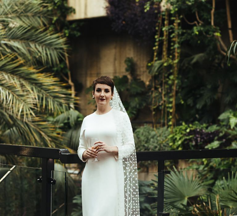 bride-with-polka-dot-wedding-veil-at-vintage-wedding