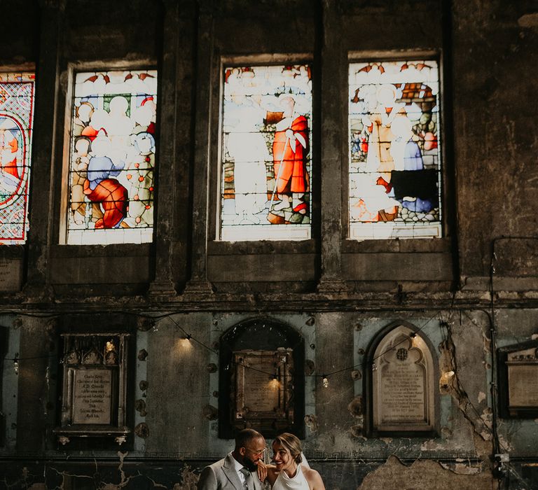 asylum-chapel-with-bride-in-satin-wedding-dress-with-groom-in-grey-suit