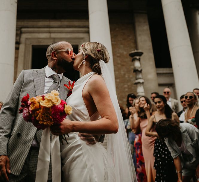 bride-and-groom-kiss-at-london-wedding